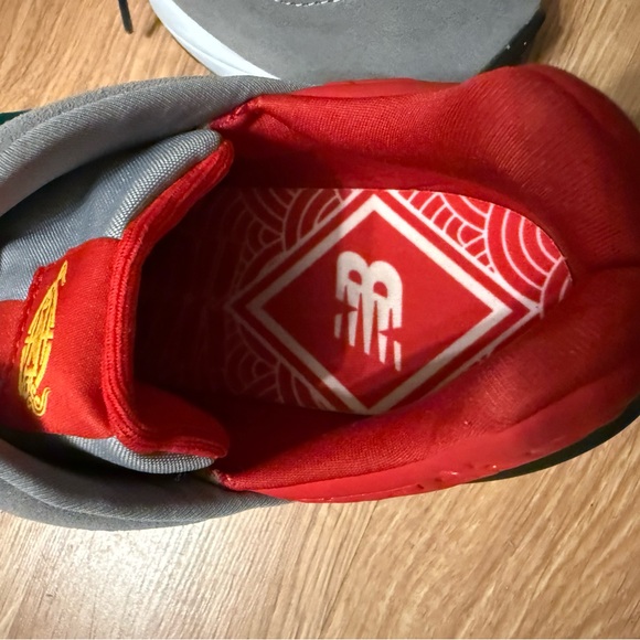 New Balance Gray Sneakers with Red, Green, and Yellow Accents - Picture 2 of 5
